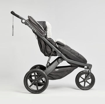 slightly unzipped side view of the Roam Performance Footmuff